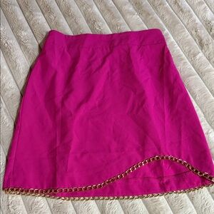 Chic Fuchsia Mini Skirt with Gold Chain Detail